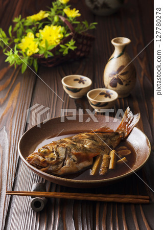 Boiled rockfish and sake Boiled rockfish and sake 127780278