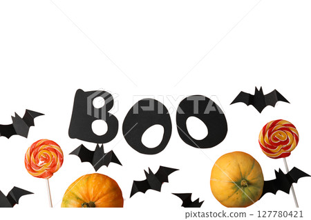 Bright Halloween decor: pumpkins and candy, isolated on white, PNG 127780421