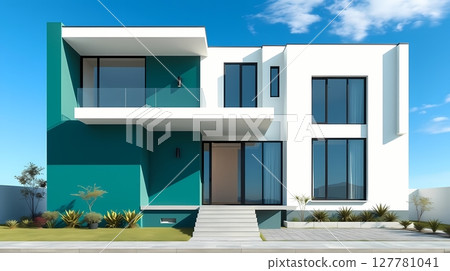 White house with teal trim under cloudless sky. 127781041
