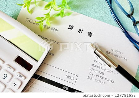 Invoice and calculator 127781652
