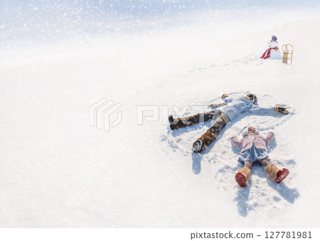 Happy and cute children playing in winter Happy and cute children playing in winter 127781981