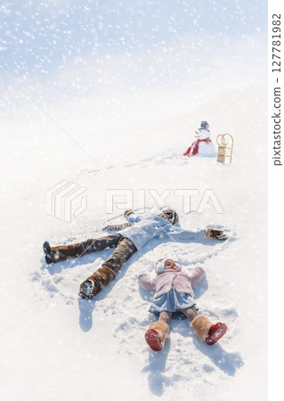 Happy and cute children playing in winter Happy and cute children playing in winter 127781982