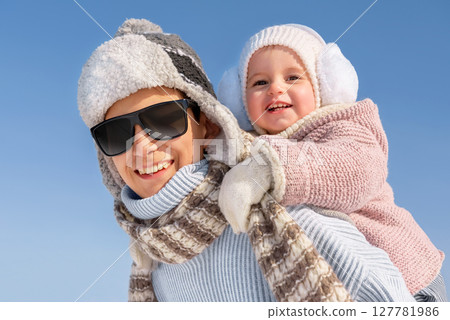 Portrait of happy children in winter 127781986