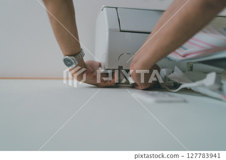 Air conditioner installation work 127783941