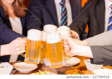 Drinking party: Toasting with beer 127784310