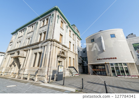 Minato Tsuruga Dashi Hall and Tsuruga City Museum on a clear day in Tsuruga City, Fukui Prefecture 127784341