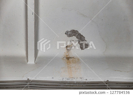 Damage ceiling from water pipelines leakage. Housing problem concept 127784536