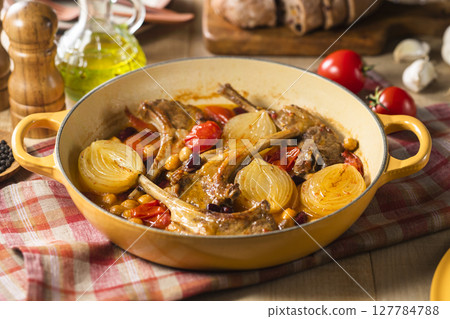 Lamb chops stewed in tomato sauce 127784788