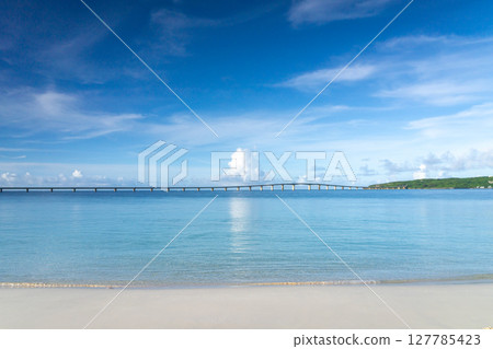 Beautiful Miyako blue and summer clouds at Yonaha Maehama Beach 127785423