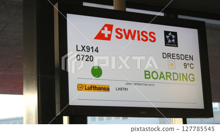 Zurich, Switzerland, April 15, 2015: Departure Monitor for Swiss Flight to Dresden Zurich, Switzerland, April 15, 2015: Departure Monitor for Swiss Flight to Dresden 127785545