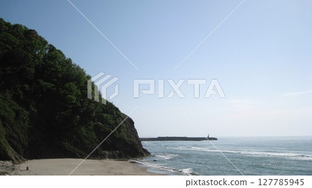 Summer blue sky, blue sea, white sand beach and green cape Summer blue sky, blue sea, white sand beach and green cape 127785945