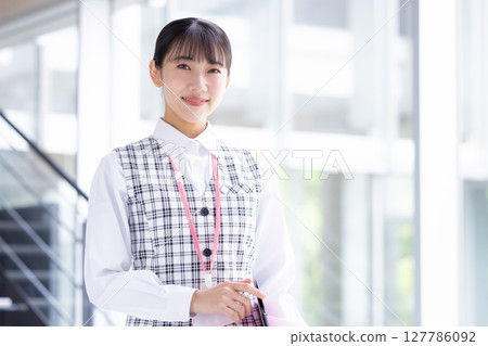 Portrait of a woman wearing a medical office uniform Portrait of a woman wearing a medical office uniform 127786092