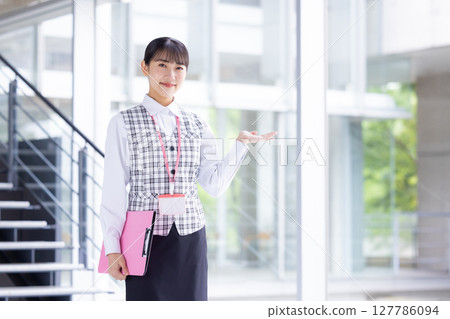 Portrait of a woman wearing a medical office uniform Portrait of a woman wearing a medical office uniform 127786094