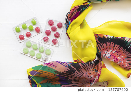 cough sore throat pastille with scarf of lifestyle arrangement flat lay style cough sore throat pastille with scarf of lifestyle arrangement flat lay style 127787490