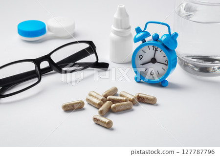 Supplement, vitamin for eye health and vision concept on white background 127787796