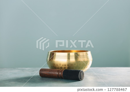 Golden Singing Bowl with Wooden Mallet for Meditation 127788467