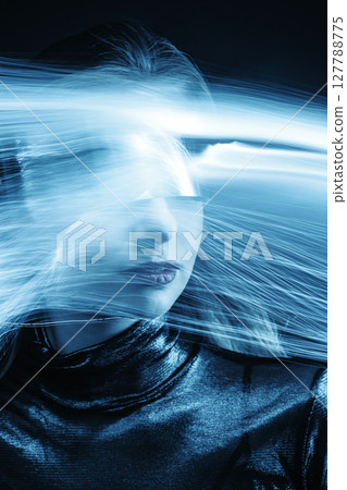 Abstract woman studio portrait with light painting technique 127788775