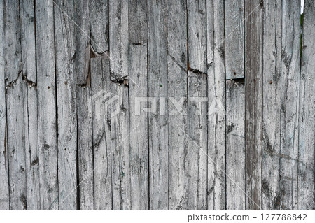 Background of an old faded wooden fence 127788842