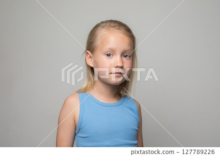 Nice smiling little girl child. Happy and beauty kid on white background, child 6 years old 127789226