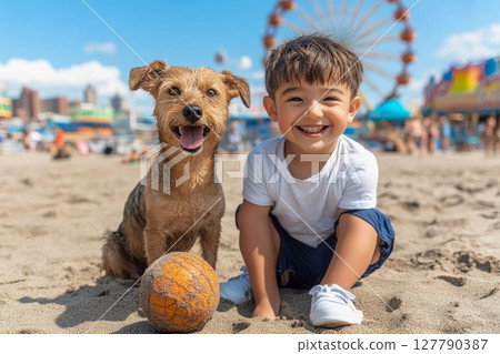 Summer memories of a smiling child and dog on the beach Summer memories of a smiling child and dog on the beach 127790387