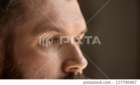 Skin-realism. Close-up of a mans skin, visible pores, light stubble, shine on the forehead 127790467