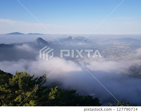 green mountain slope with mountain 127790714