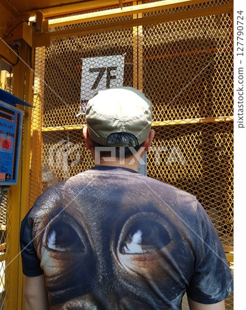 green mountain slope with mountain 127790724