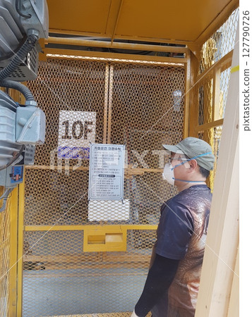 green mountain slope with mountain 127790726