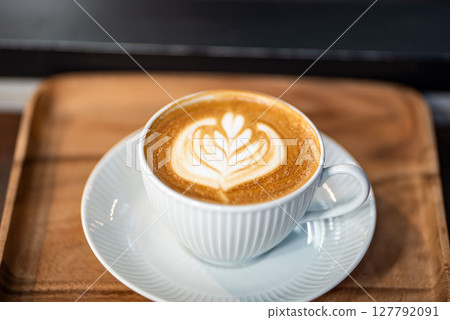 Beautifully drawn latte art Beautifully drawn latte art 127792091