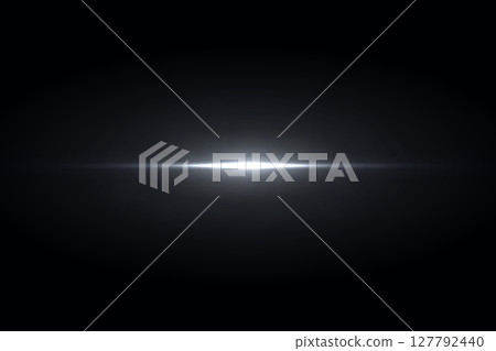 White bright light flare glowing on dark background White bright light flare glowing on dark background 127792440