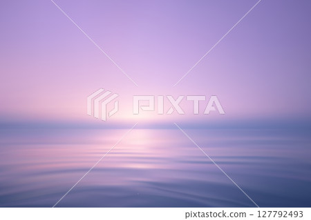 Dreamy ocean scene with soft pink purple sunrise Dreamy ocean scene with soft pink purple sunrise 127792493