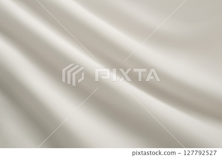 White fabric texture with gentle diagonal folds close-up. 127792527