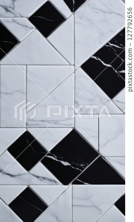 Black and white marble tiles in geometric pattern, close-up. Elegant stone texture for modern interior design and architecture 127792656