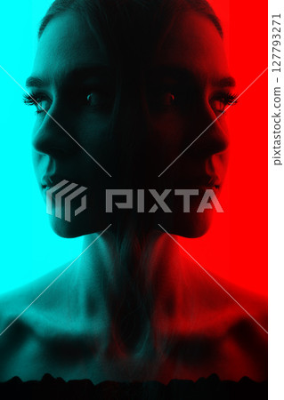 Dark face silhouette of beautiful and sexy woman in RGB color split effect style 127793271