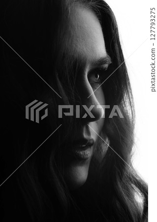 Dark face silhouette of beautiful and sexy woman 127793275