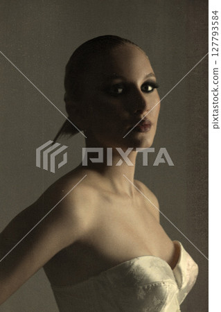 Beautiful woman dark silhouette studio retro vintage portrait 127793584