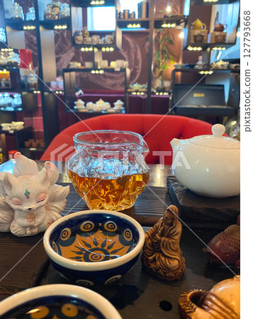 Traditional Tea Ceremony with Elegant Serving Ritual. 127793668