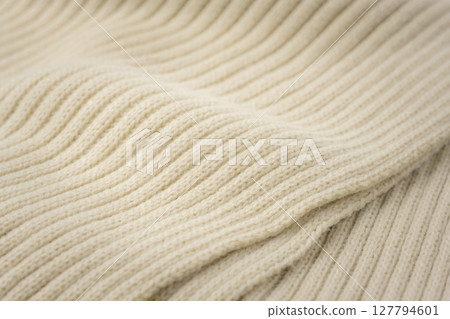 米色針織布料的特寫，溫暖的冬季材料 127794601