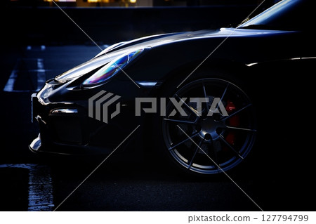 Shiny black sports car 127794799