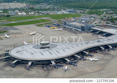 Planes at Vnukovo International Airport. Bird's-eye view. Planes at Vnukovo International Airport. Bird's-eye view. 127795106