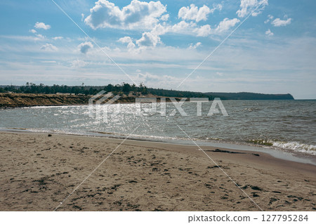 Baikal lake sand beach, Olkhon island. Summer natural landscape. 127795284