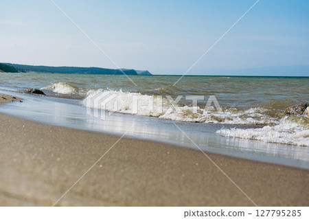Baikal lake sand beach, Olkhon island. Summer natural landscape. 127795285
