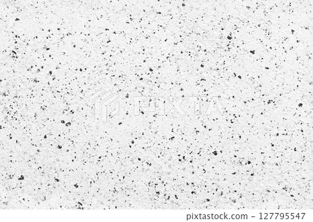 High-resolution seamless photo of a white textured surface with black speckles 127795547
