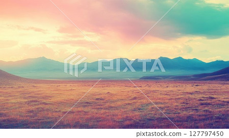 Golden Meadow Meets Majestic Mountains Under Pastel Sky with Tranquil Valley Views, Serene Nature's Embrace 127797450