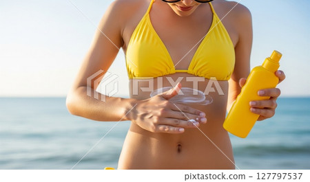 Beach Beauty Applies Sunscreen Protection During Tropical Summer Vacation 127797537