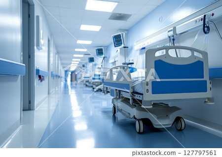 Pristine Hospital Ward Corridor With Blue Medical Beds and Advanced Patient Monitoring Systems 127797561