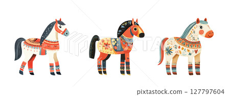 Three decorated horses standing side by side 127797604