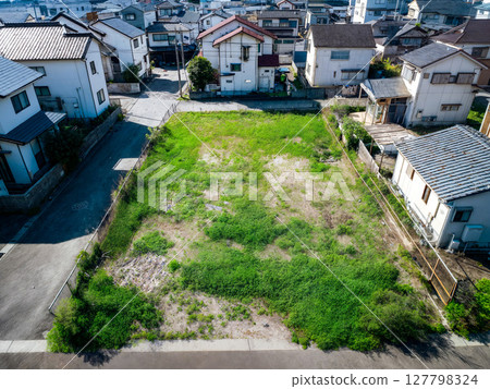 Vacant lot in residential area [AI] 127798324