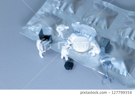 Miniature Crime Scene Investigation on Pill Blister Pack Miniature Crime Scene Investigation on Pill Blister Pack 127799358