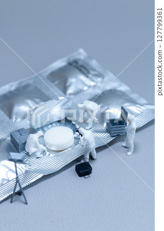 Miniature Crime Scene Investigation on Pill Blister Pack Miniature Crime Scene Investigation on Pill Blister Pack 127799361